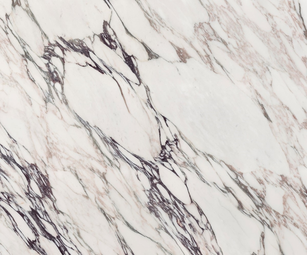 Calacatta Viola marble with burgundy veining on an ivory background